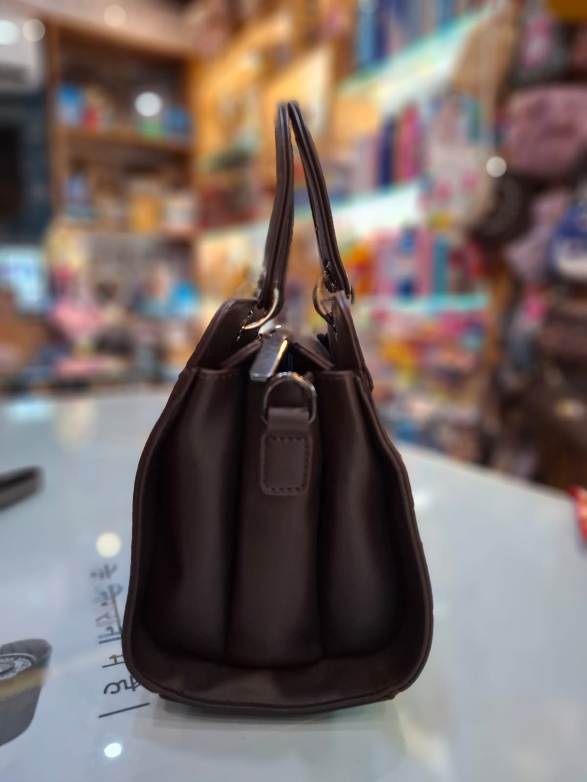 Luxurious Embossed Totem Handbag