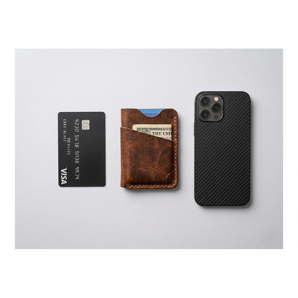 Leather card holder wallet comparison with credit card and phone slim minimalist wallet size reference